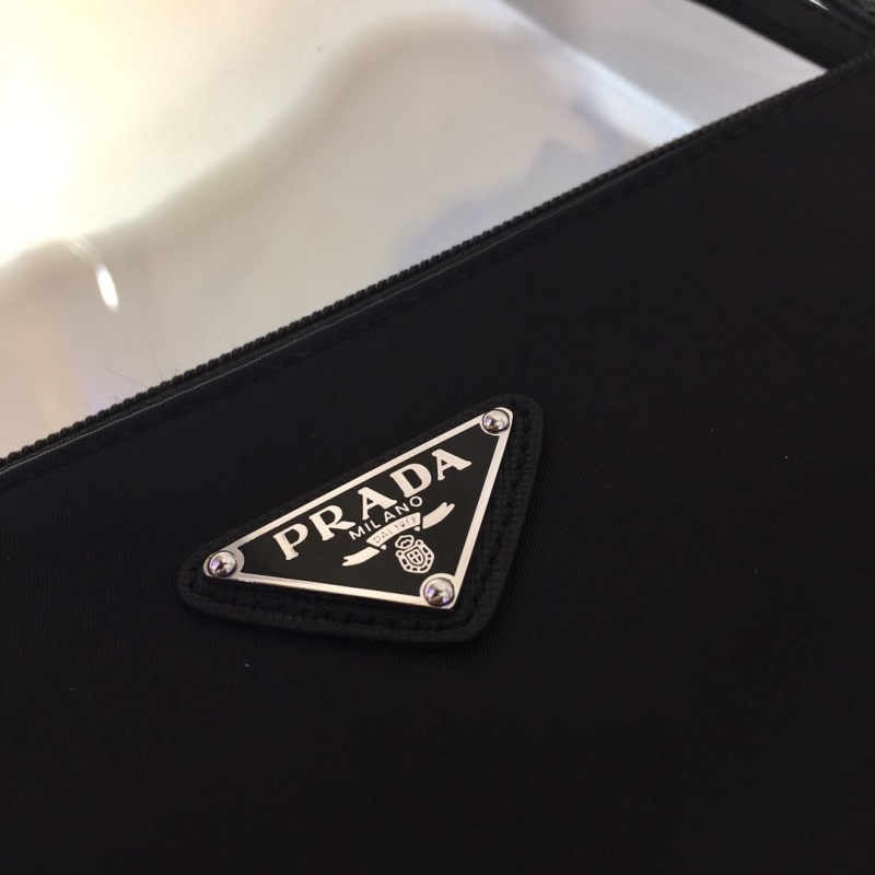 Pra*a clutch bags